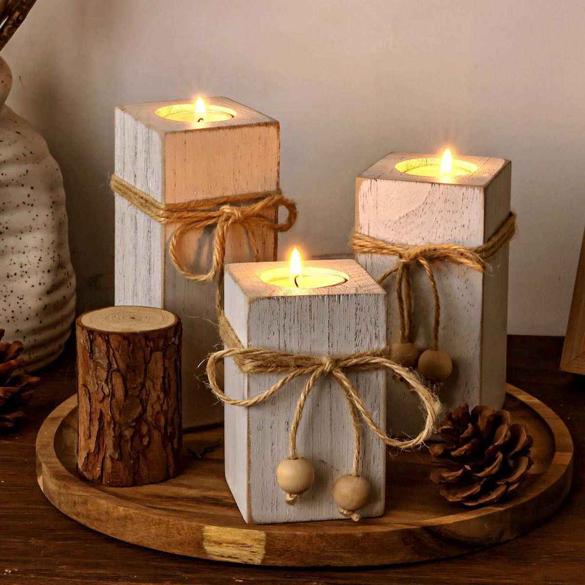 MelonBoat rustic flameless candles in a 3-pack glowing on a tabletop for safe mood lighting