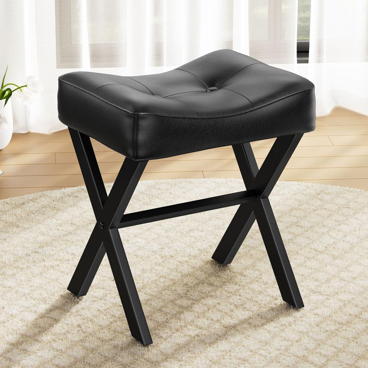 Memobarco 18-inch leather vanity stool front view emphasizes premium saddle seat comfort.