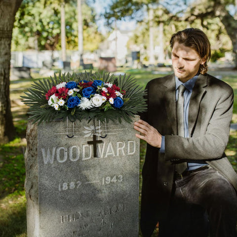 Adjustable legs extended to fit varied gravestones for stability