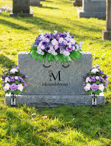 Adjustable rust-resistant handle and clips protect the headstone during installation.