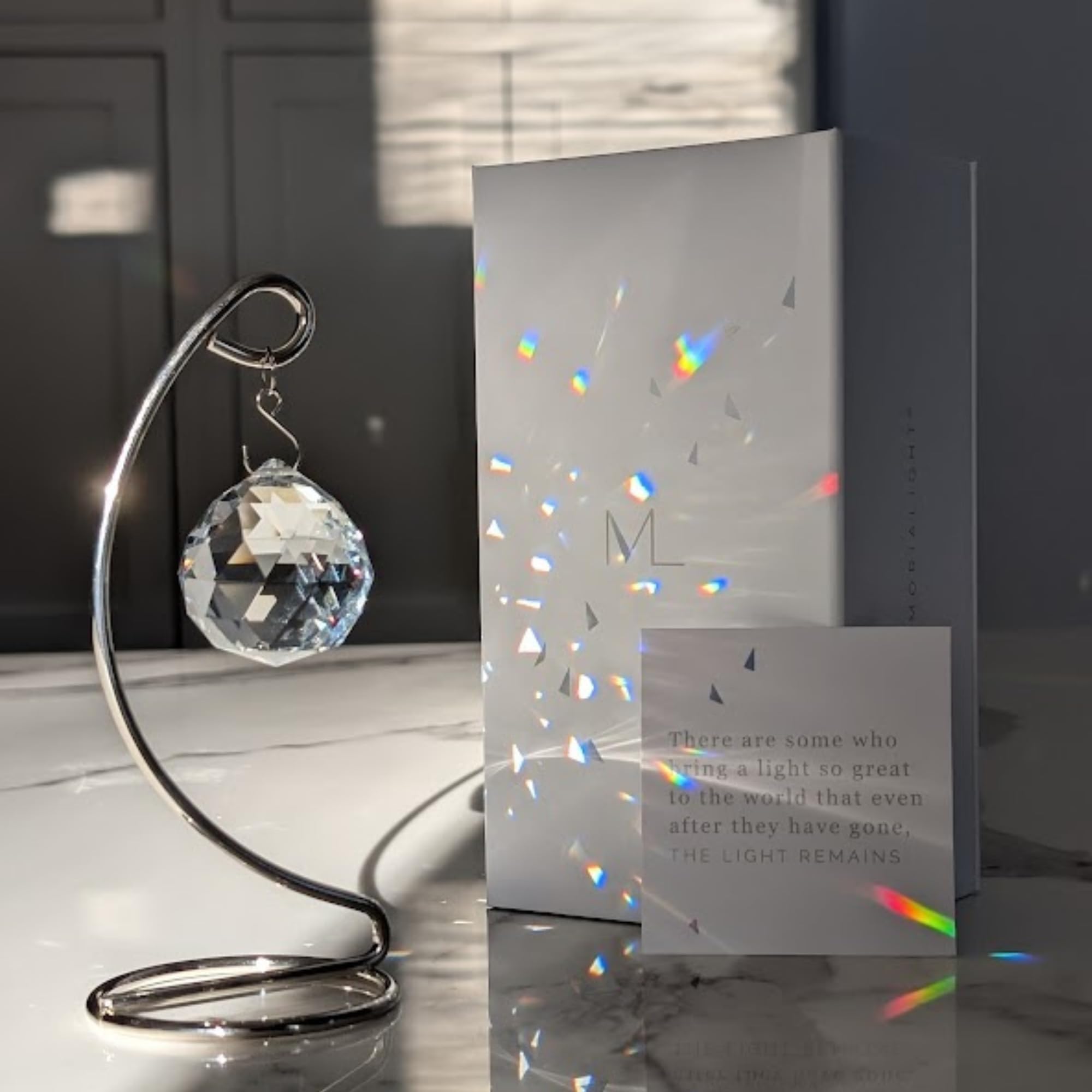 Memorialight crystal ball rainbow maker reflecting sunlight for daily remembrance