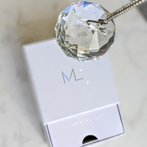 Memorialight bereavement gift enhances space with soft rainbow light and comfort.