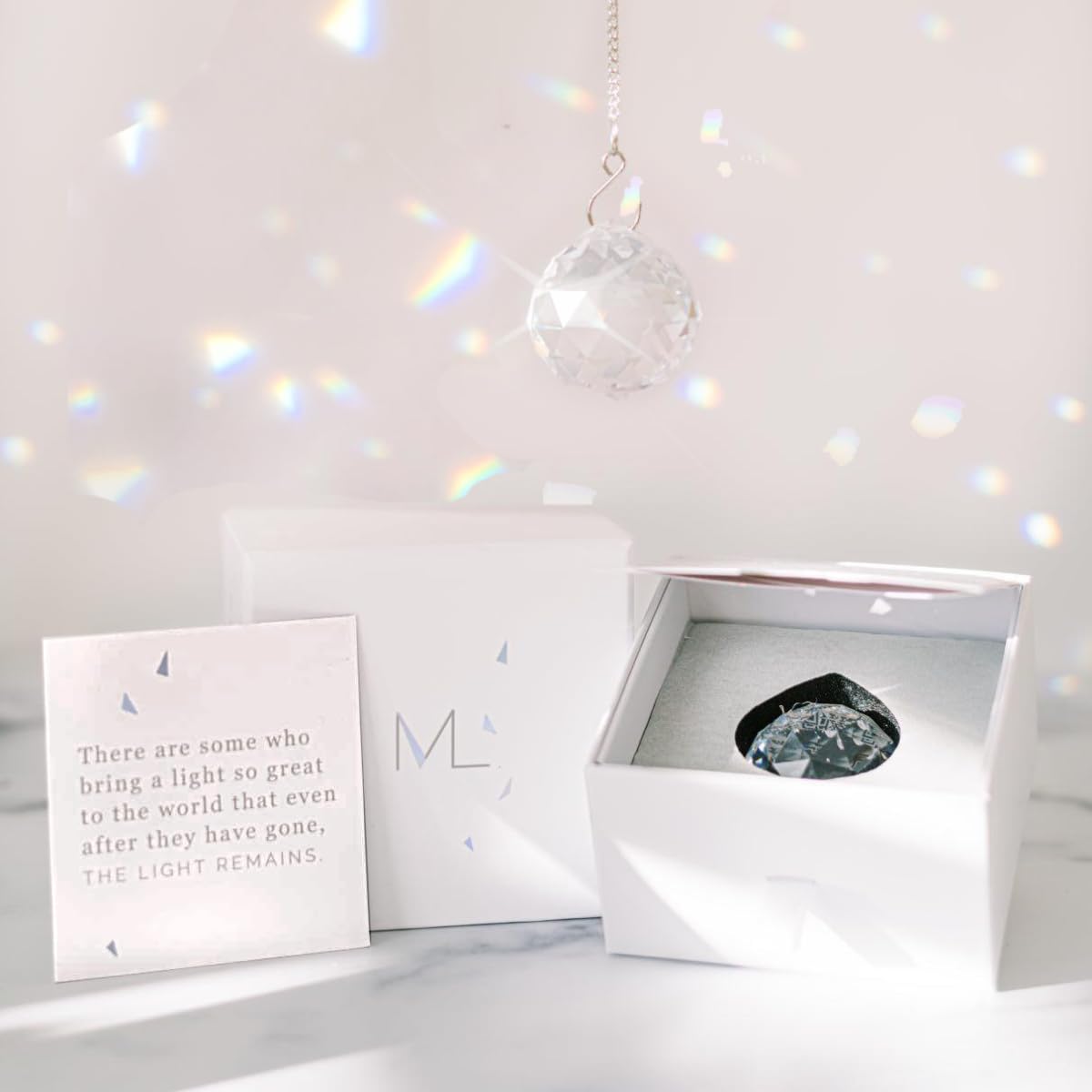 Memorialight rainbow prism ornament glows in sunlight for daily remembrance.
