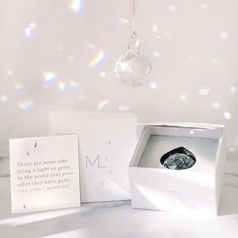 Memorialight rainbow prism ornament glows in sunlight for daily remembrance.