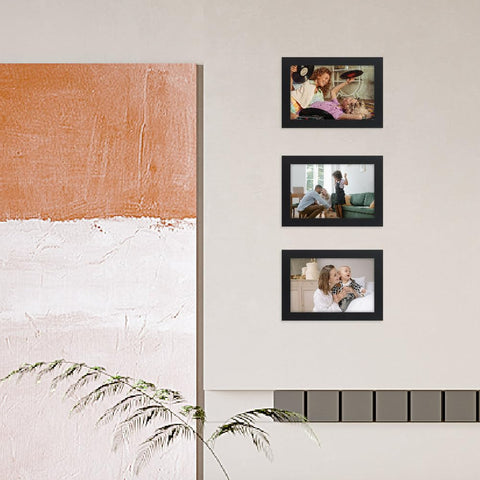 Memory Island frames feature built-in stands and wall-mount slots for flexible setup.