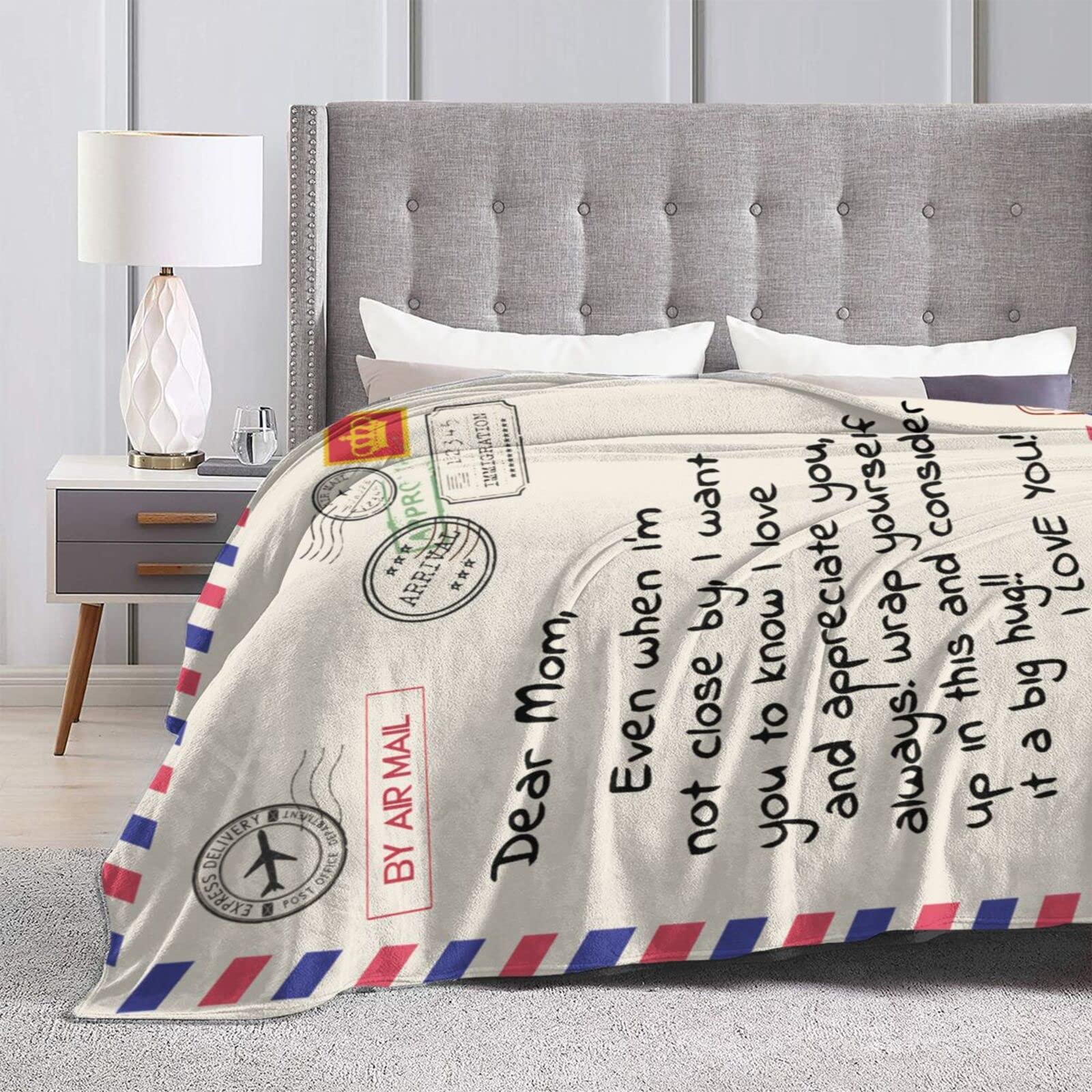Menghao Dear Mom blanket shown in two sizes option