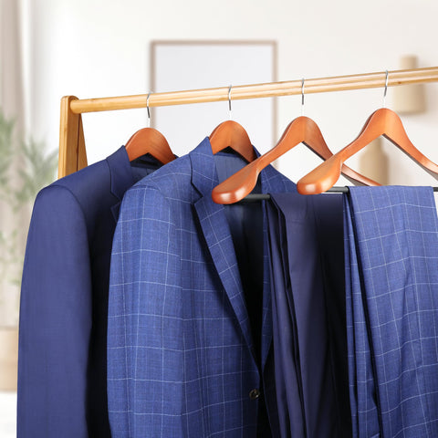 MEQUTION heavy-duty wooden hanger keeps suits and pants neatly suspended.