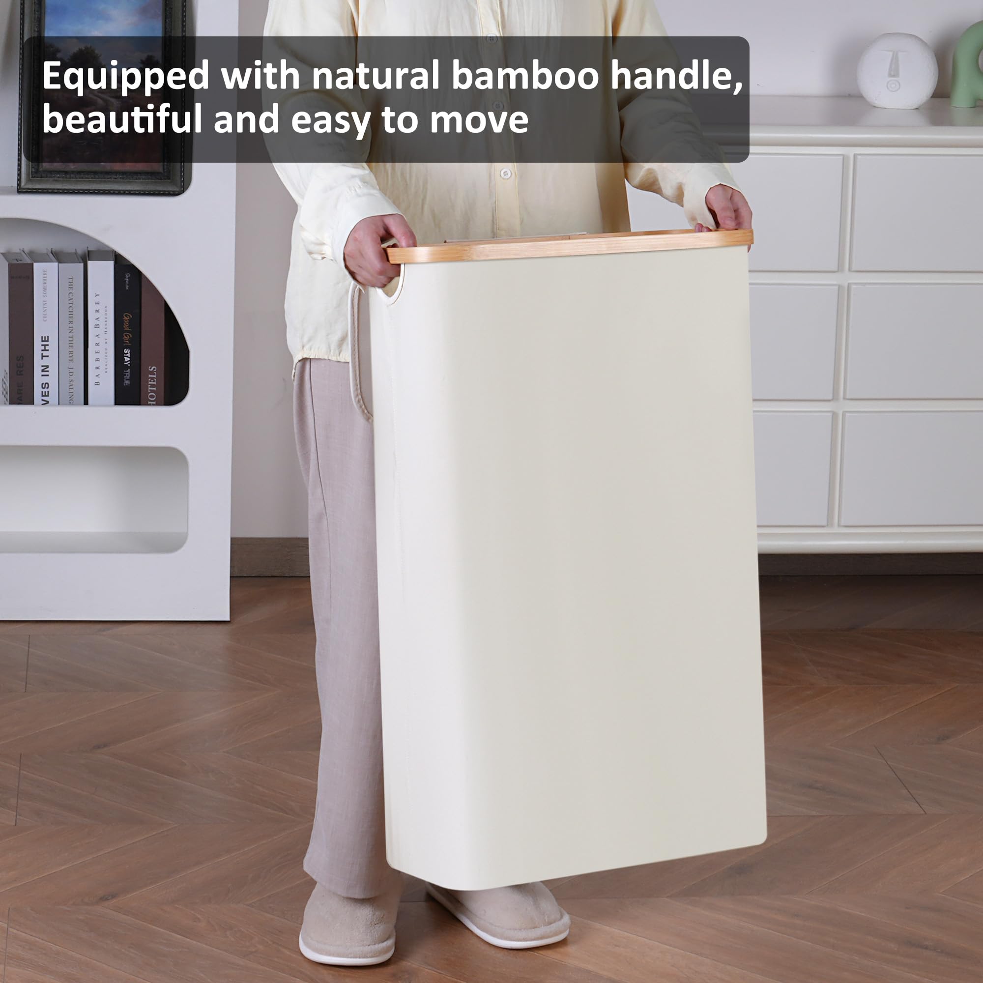 Merkisa Slim Laundry Hamper in a dorm room used for clothes and towels.