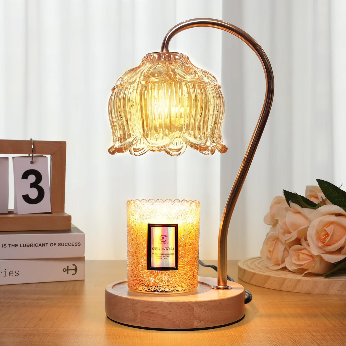 Merrtody Dimmable Flower Candle Warmer Lamp base on a wood surface for safe fragrance diffusion.
