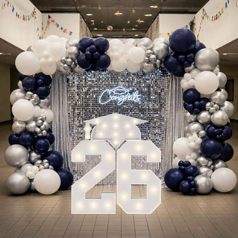 Merry Mosaics class of 2026 setup on a party table