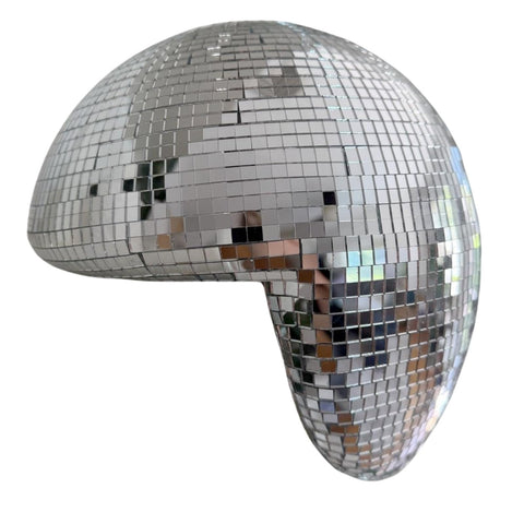 MFGDISCO melted disco ball ornament with mirrored surface enhances shelves with sparkle.