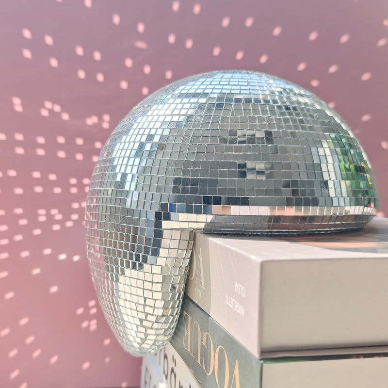 MFGDISCO reflective mirror surface shines under lights, creating dynamic room focal point.