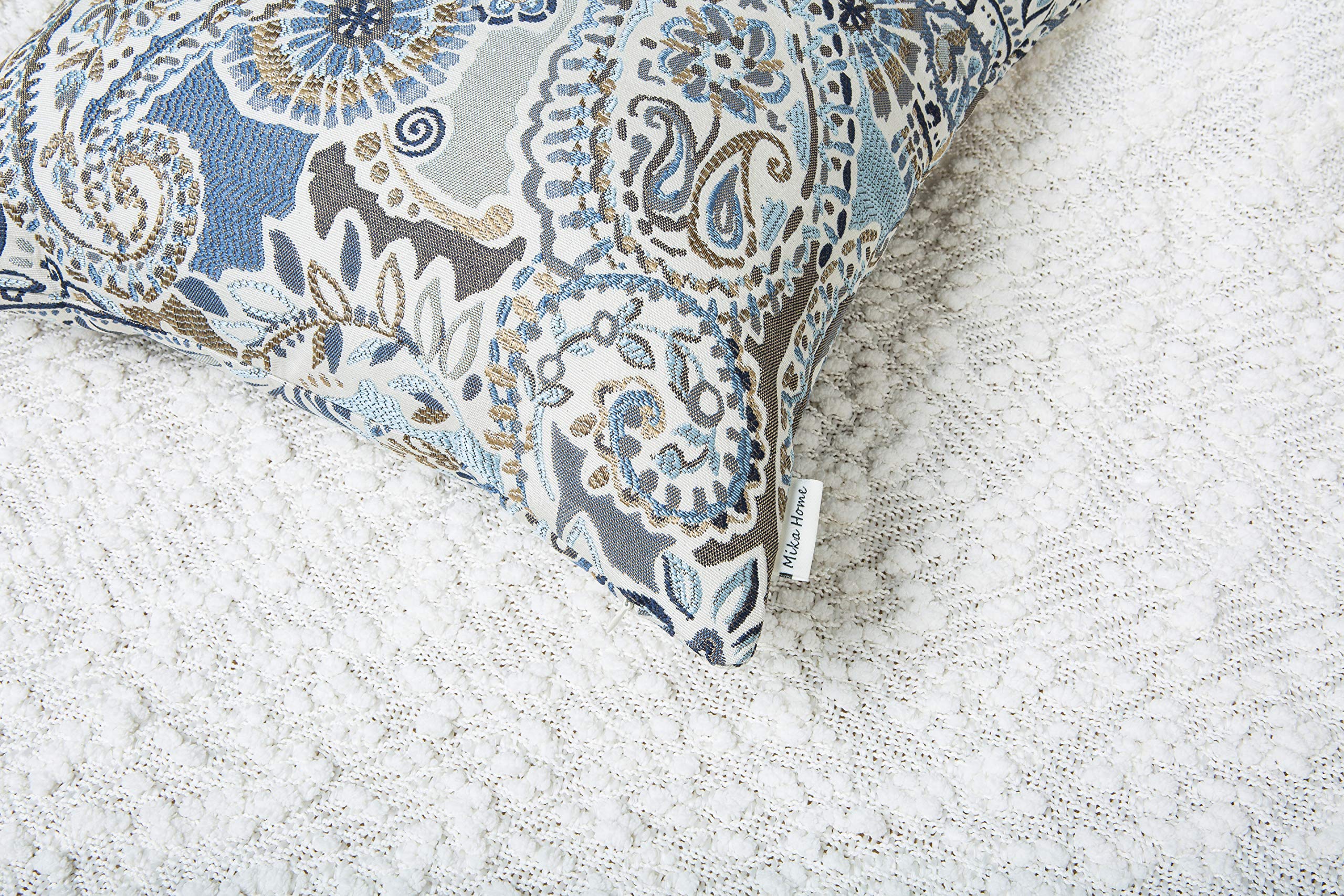 Mika Home pillow cover enhances living room decor with chic styling