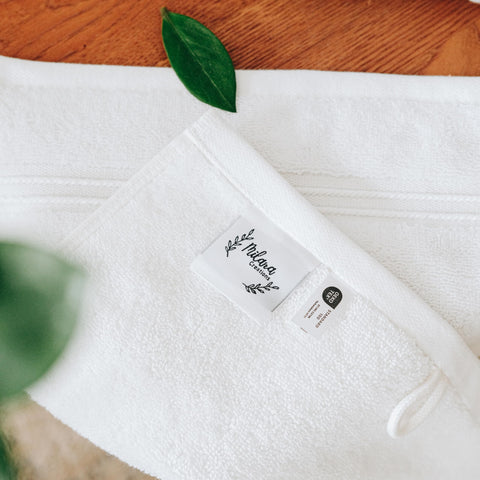 Milara hand towels with hanging loops for easy storage