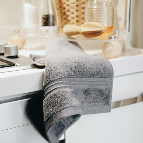 Milara wash cloths anthracite color enhances bathroom decor while staying practical.