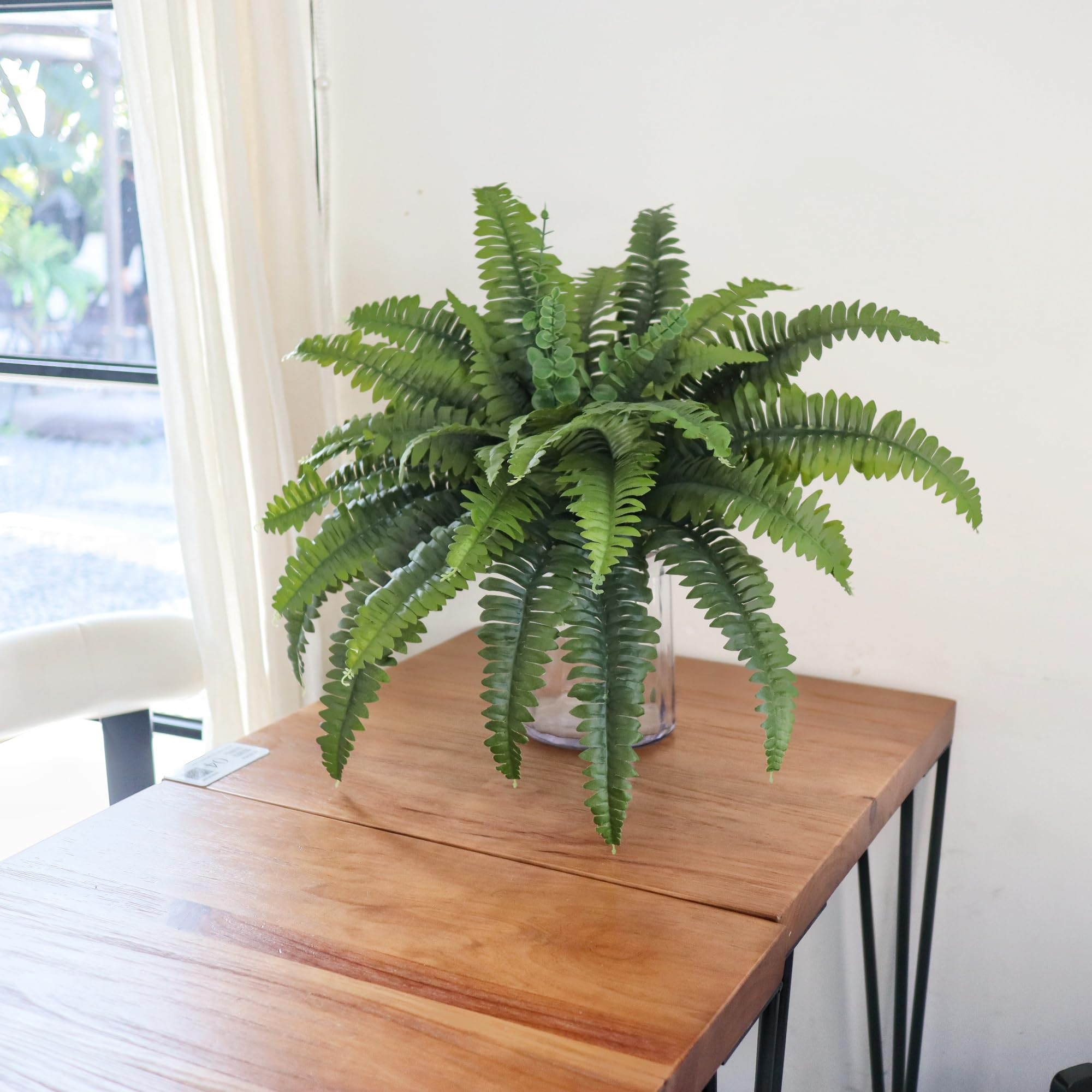 MILHAO FOREST UV-resistant faux ferns stay vibrant year-round.