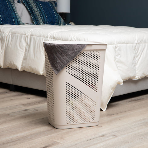Mind Reader 60L slim laundry hamper in ivory with lid closed.