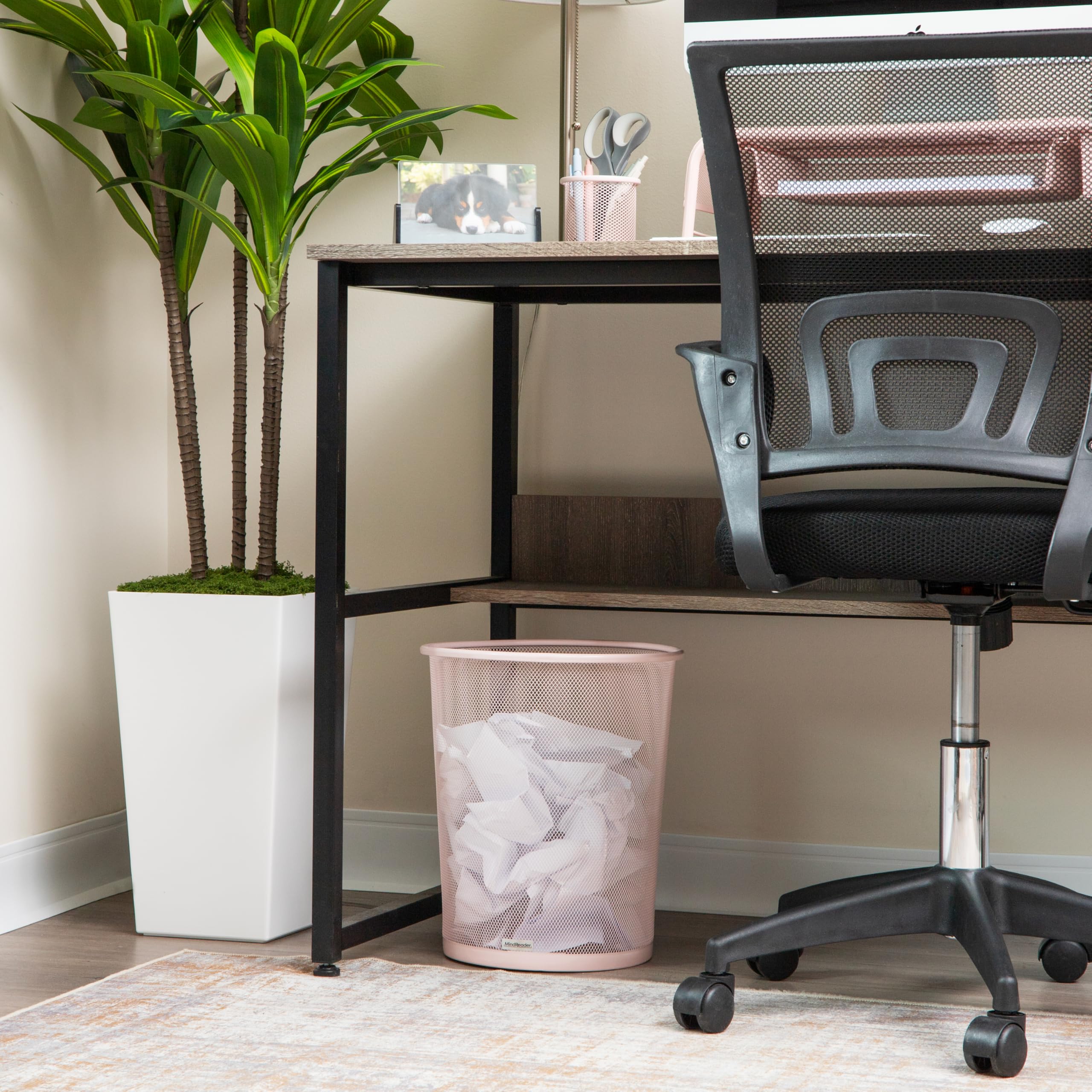 Mind Reader pink mesh trash can in a modern room setup, keeps waste tidy and accessible
