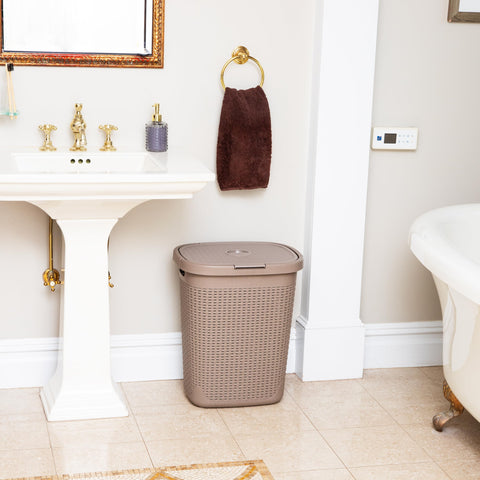 Mind Reader slim hamper base narrows for compact floor footprint.