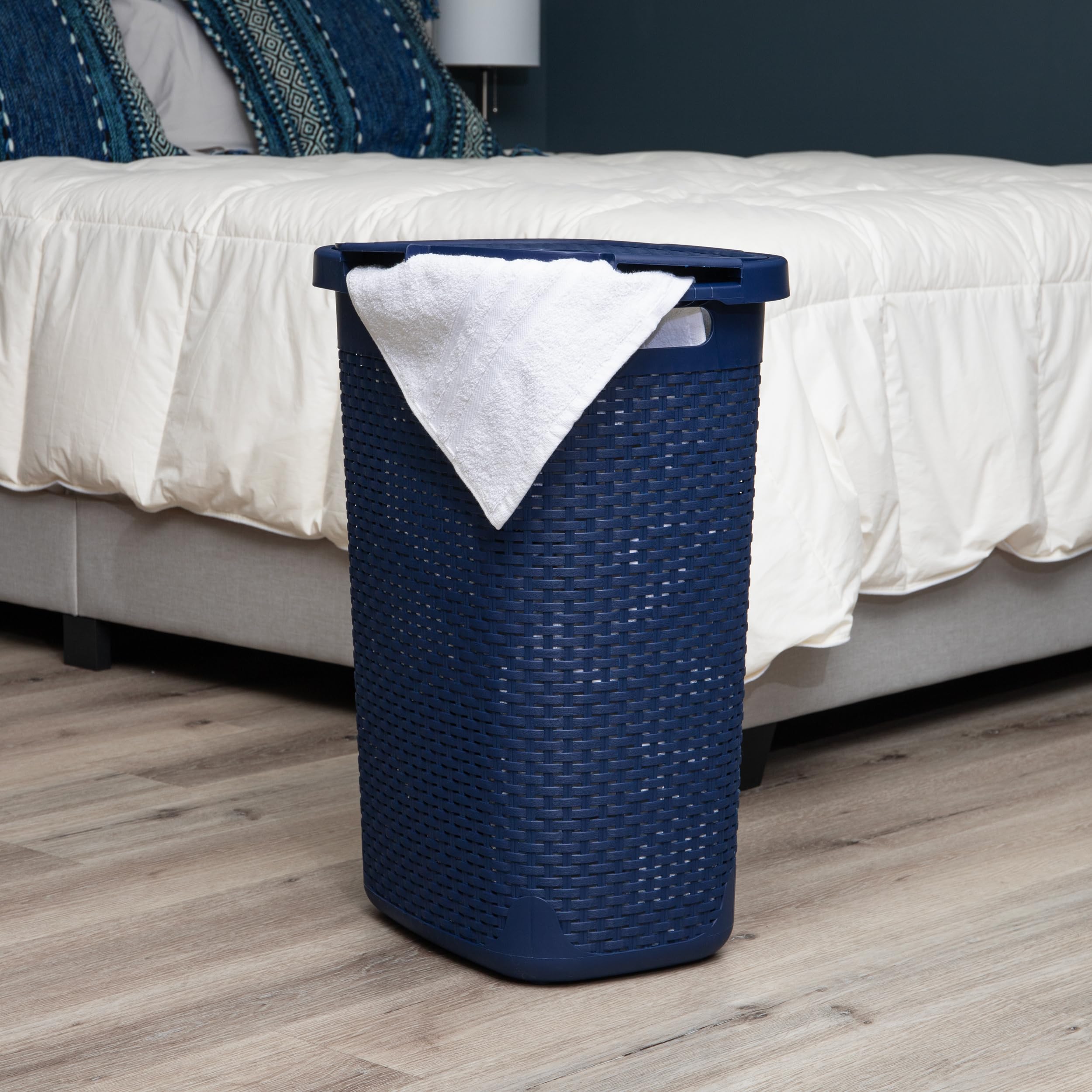 Mind Reader slim laundry hamper with lid on for discreet storage and odor control.