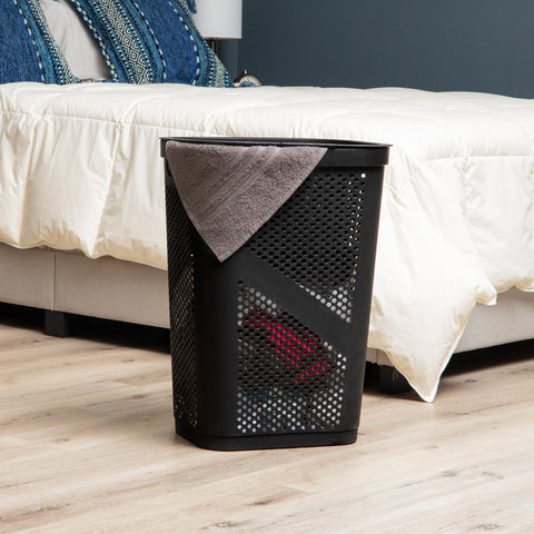 Mind Reader slim hamper features ventilated sides to reduce odor during laundry days