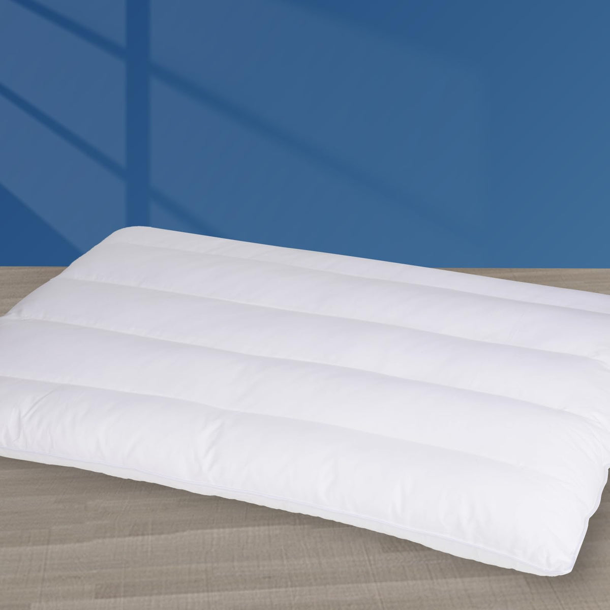 MINUPWELL Ultra Flat Pillow king size supports stomach sleepers comfortably.