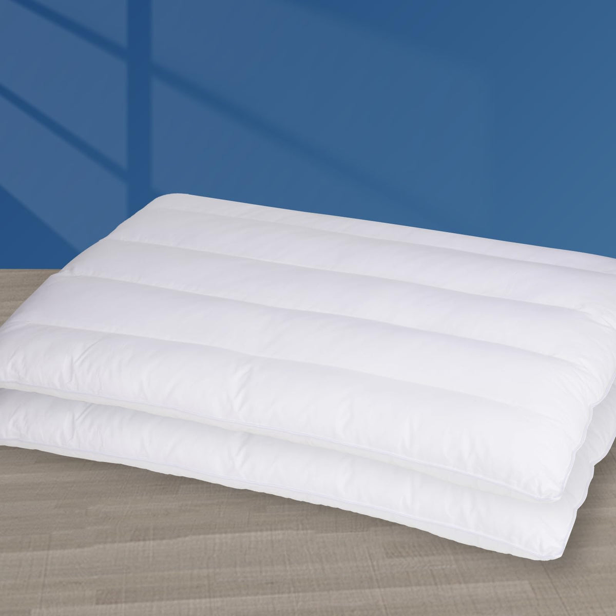 MINUPWELL ultra flat pillow packaging shown, compact and ready to ship.