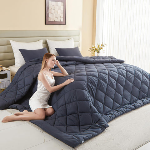 MIOTO 132x120 oversized king comforter in grey provides full bed coverage and elegant drape.