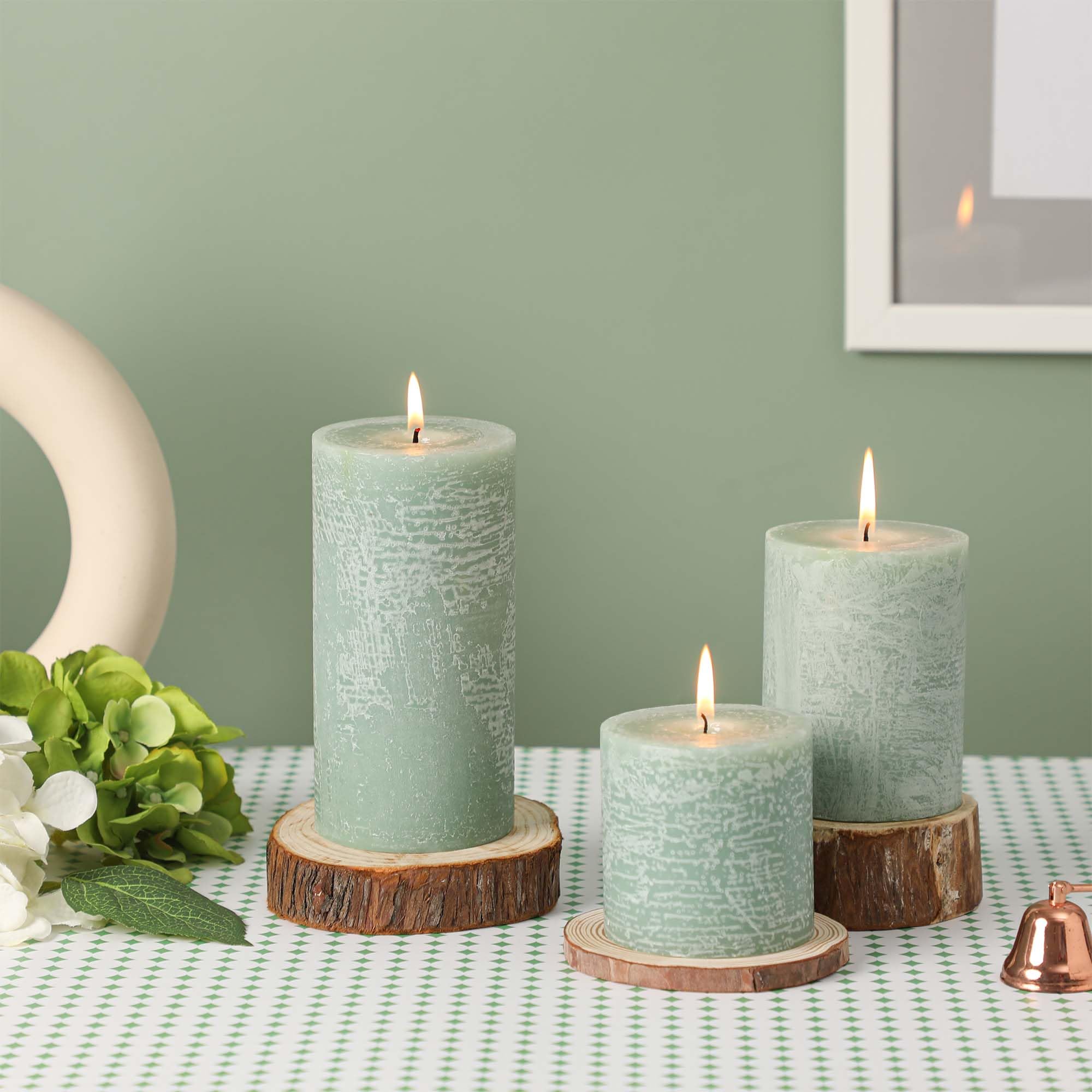 MIRASCENTS Sage Green Pillar Candles on dining tables create elegant, odor-free atmosphere.