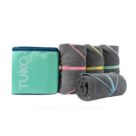 MISSION Tuko microfiber beach towel demonstrating quick-dry performance after swimming