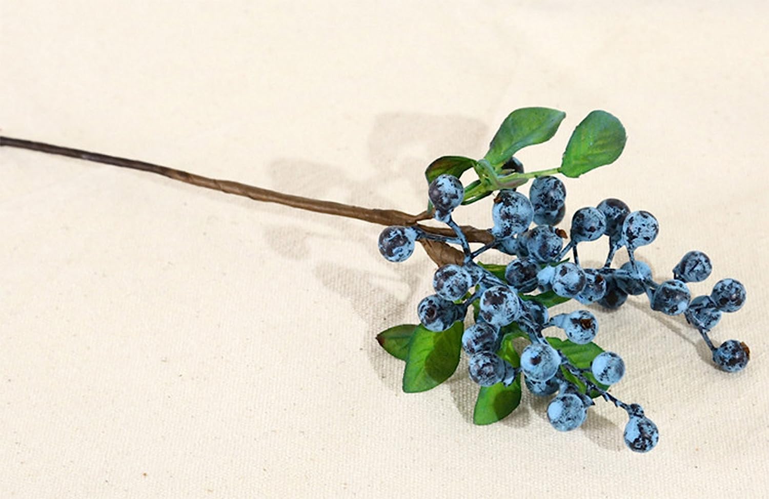Mistari artificial blueberries stems in a vase for easy decor