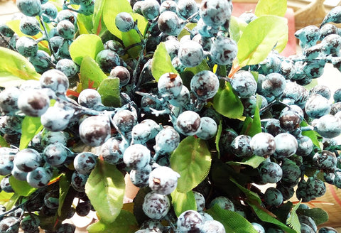 Mistari artificial blueberries stems enhancing wedding decor with blue accents