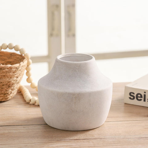 Mitt&Ditt off-white farmhouse vase on a modern mantle elevates subtle decor.