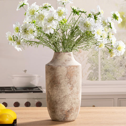 Mitt&Ditt off-white vase in living room setup with greenery.
