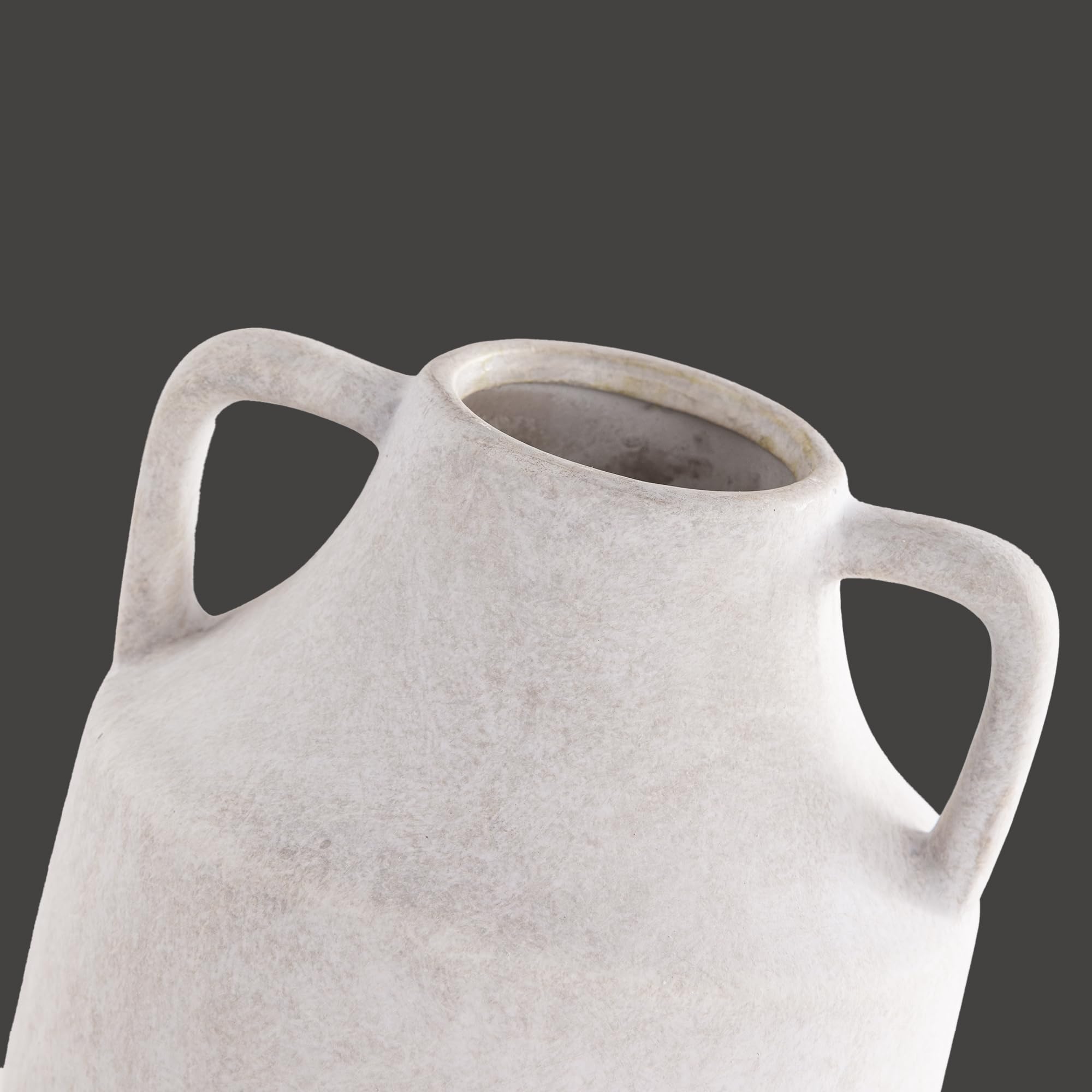 Mitt&Ditt handcrafted terracotta vase highlights textured surface and warm tones.