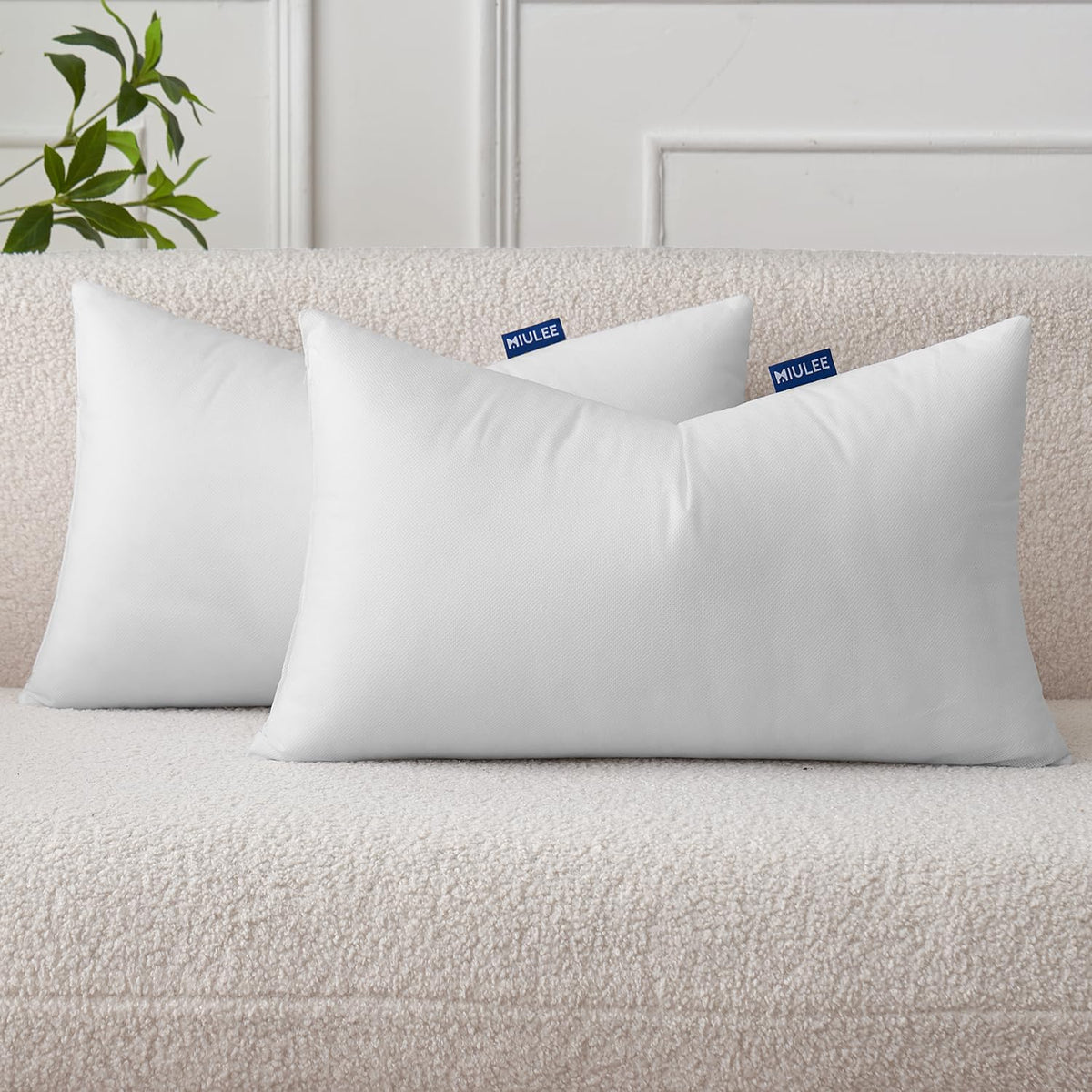 MIULEE 12x20 pillow insert on a sofa adds comfortable fullness.