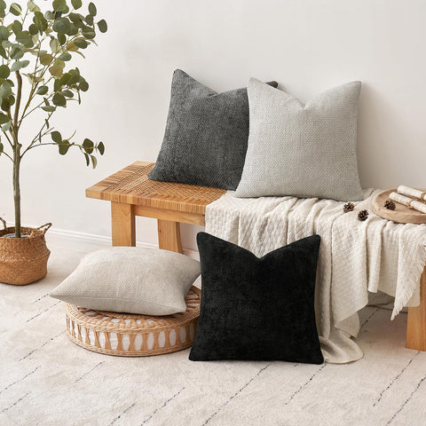 MIULEE four-pack keeps living room decor cohesive on sofa and chairs.