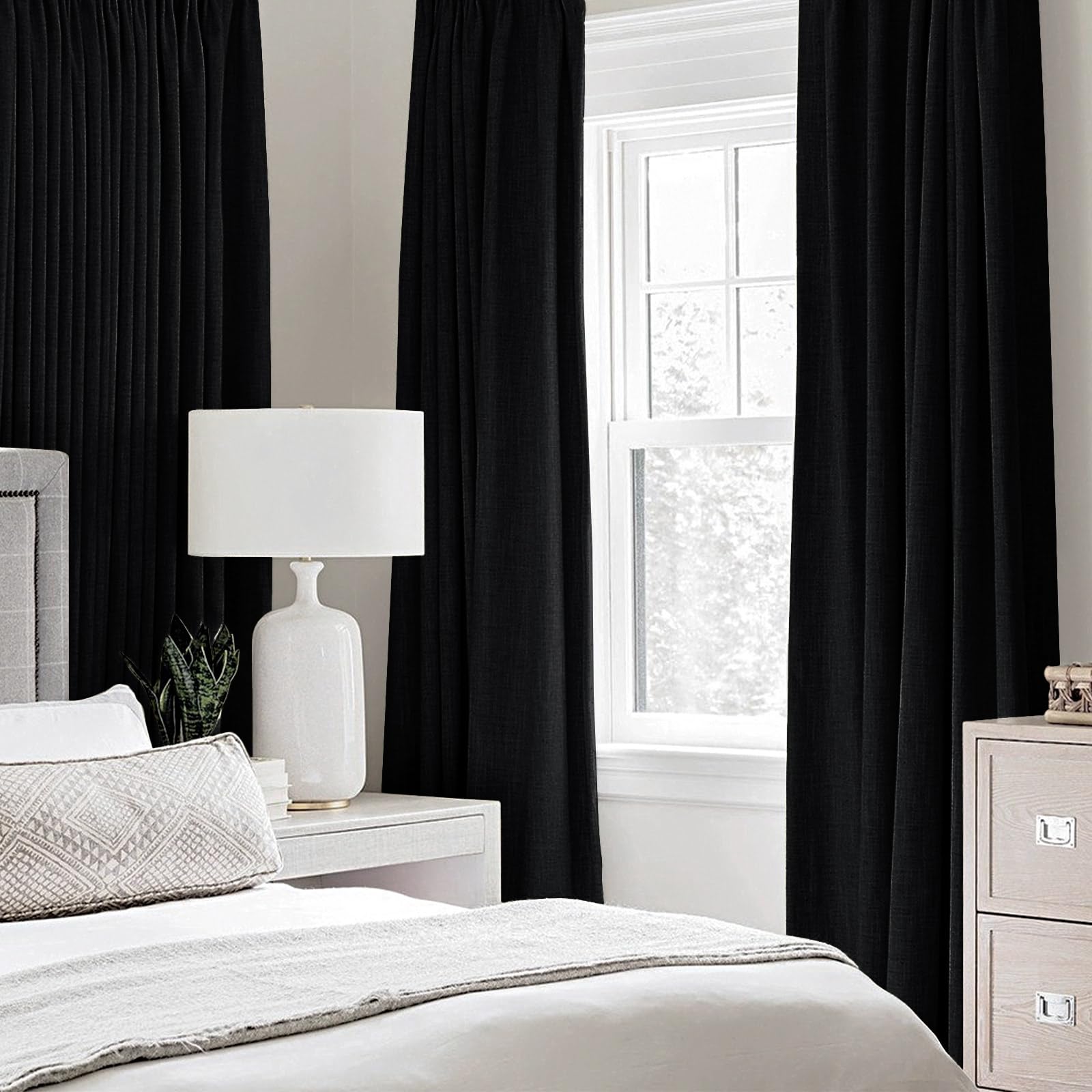 MIULEE blackout curtains darken the bedroom for daytime rest