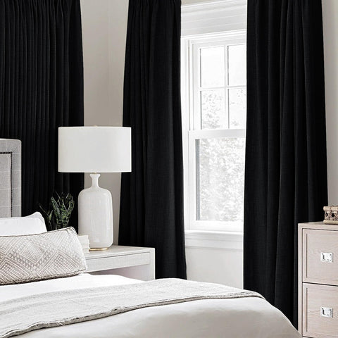 MIULEE blackout curtains darken the bedroom for daytime rest