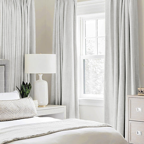MIULEE 100% blackout curtains block daylight for better daytime rest and focus.