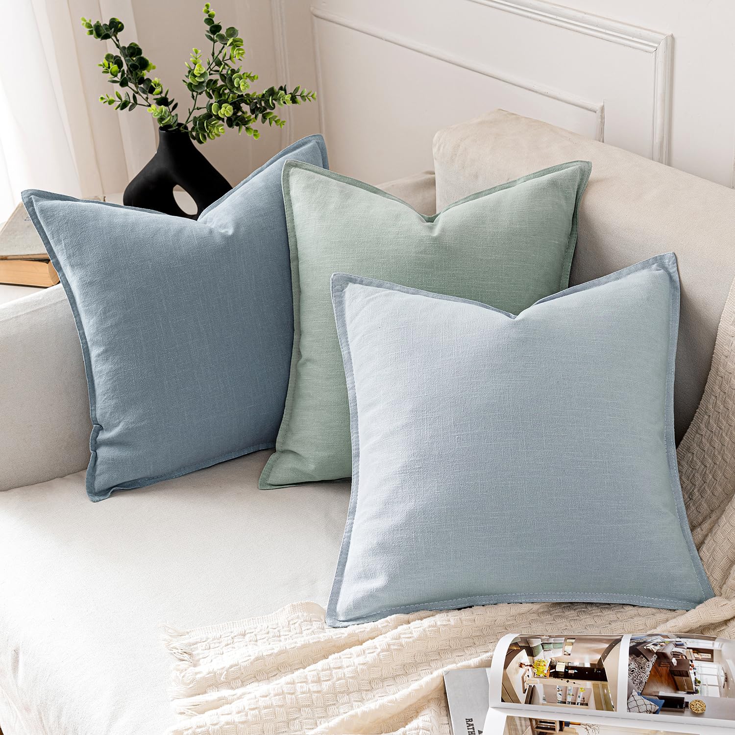 MIULEE boho farmhouse pillow cover with flange edges on a couch