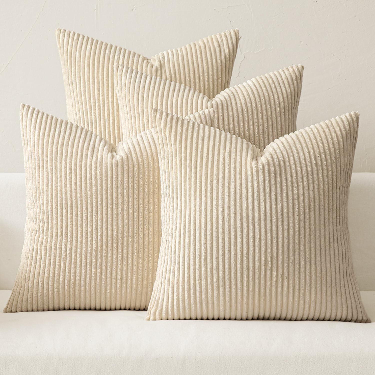 MIULEE boho farmhouse pillow covers on a neutral sofa for cozy living room styling