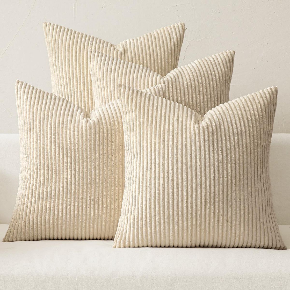 MIULEE boho farmhouse pillow covers on a neutral sofa for cozy living room styling