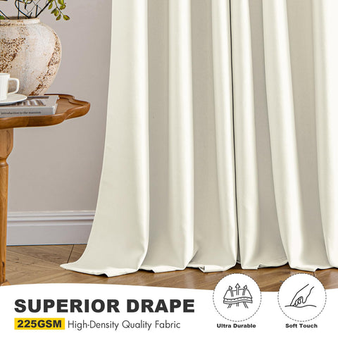 MIULEE Cream Blackout Curtains draped in a living room for cohesive decor