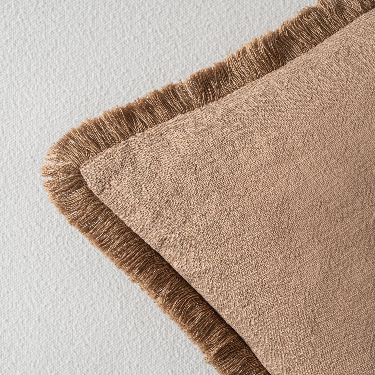 MIULEE brown boho pillow cover on sofa creates a relaxed, cohesive look