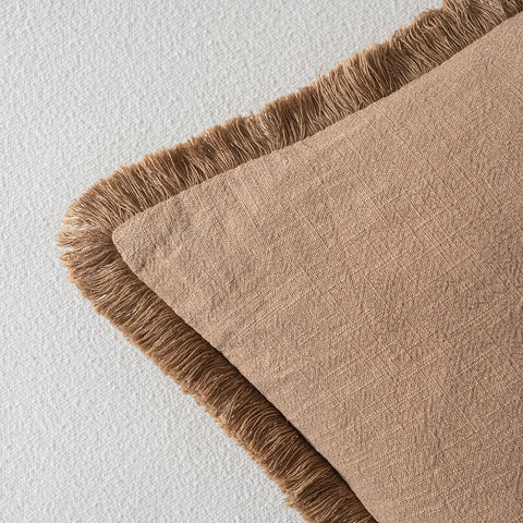 MIULEE brown boho pillow cover on sofa creates a relaxed, cohesive look