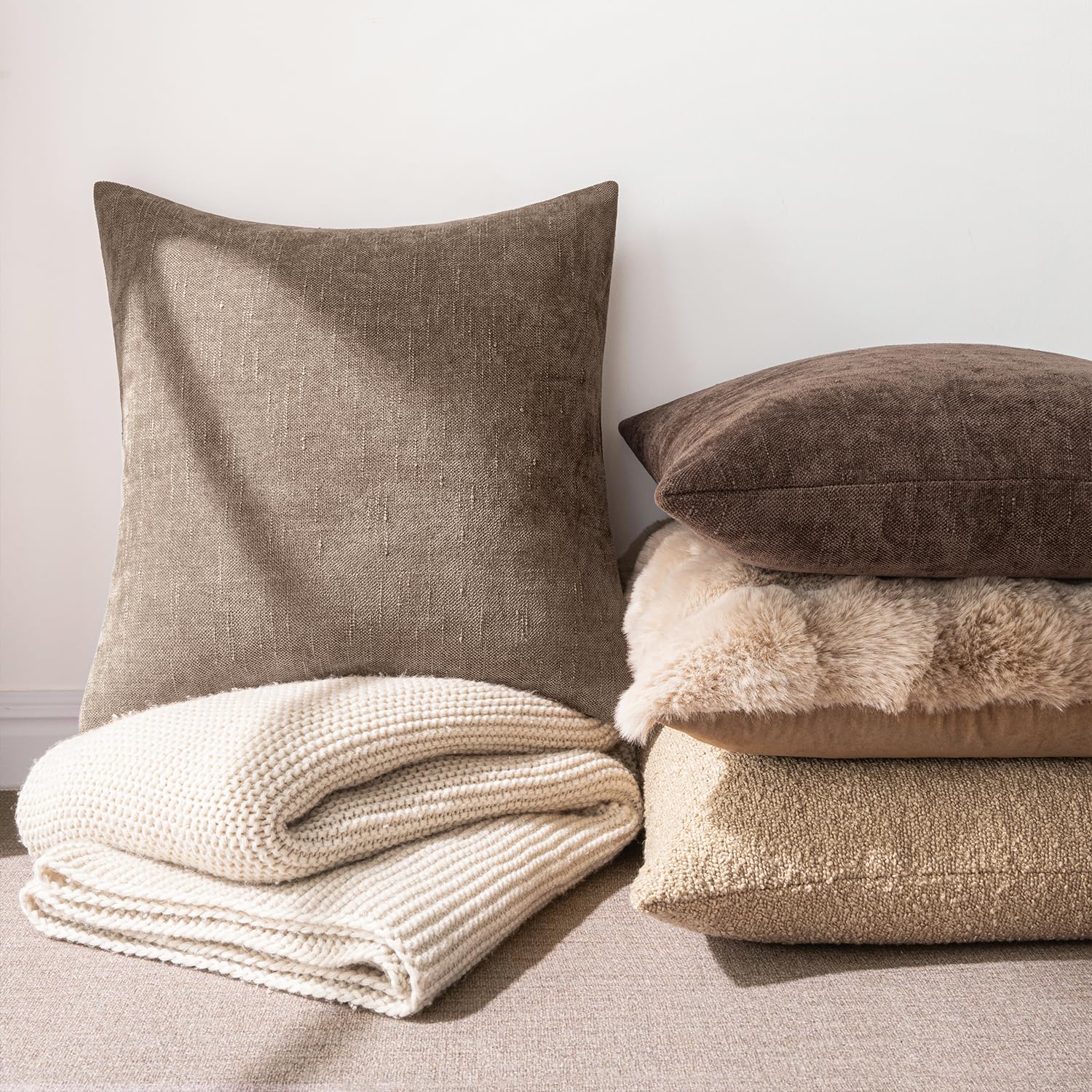 MIULEE euro sham on sofa demonstrates large 26x26 coverage for big cushions.