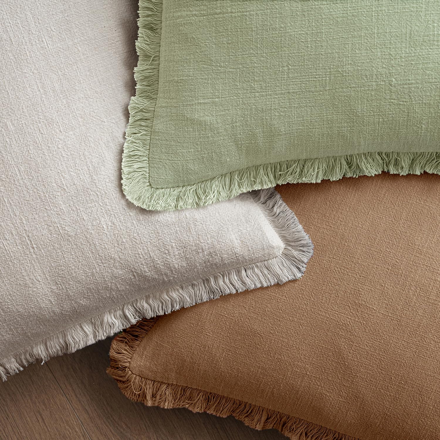 MIULEE farmhouse-style sage-green pillow cover suits indoor living spaces.