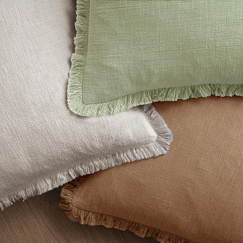 MIULEE farmhouse-style sage-green pillow cover suits indoor living spaces.