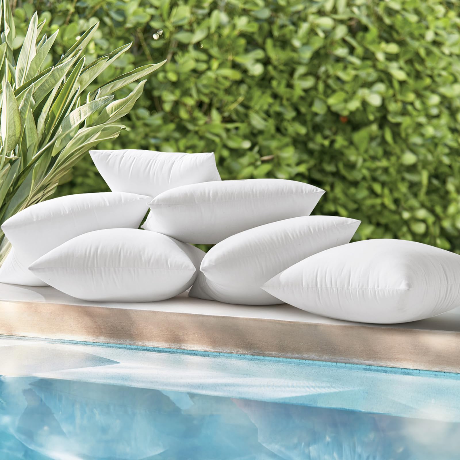 MIULEE outdoor pillow inserts used as lumbar support on garden furniture.